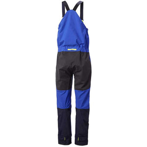 Helly Hansen blue and black waterproof sailing bib trousers seen from the back