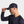 Man wearing a navy Mission baseball cap