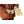 Person wearing beige leather work gloves with a power button on the wrist