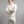 Man wearing a cream Merino Skins long sleeve quarter zip thermal top