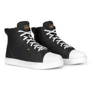 Pair of black Cortech high top motorcycle sneakers with white laces and white rubber toe caps