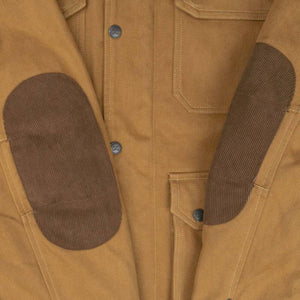 Mobile Warming tan canvas jacket with dark brown corduroy elbow patches and button closures