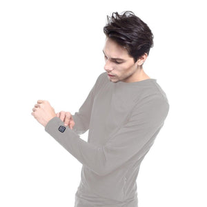 Man wearing a grey Glovii long sleeve shirt with a power button graphic on the cuff